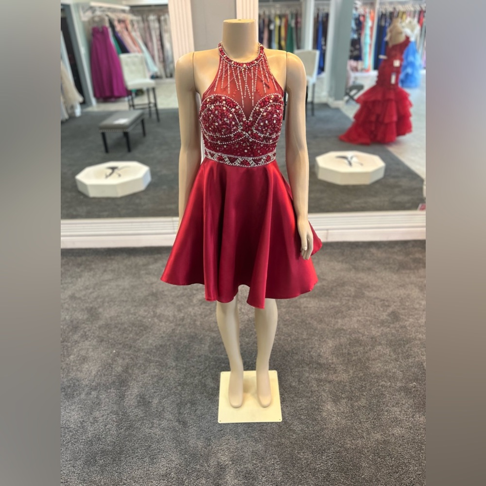 Sizes 10,4,8 available. Sold separately. halter top. skater skirt. beaded top